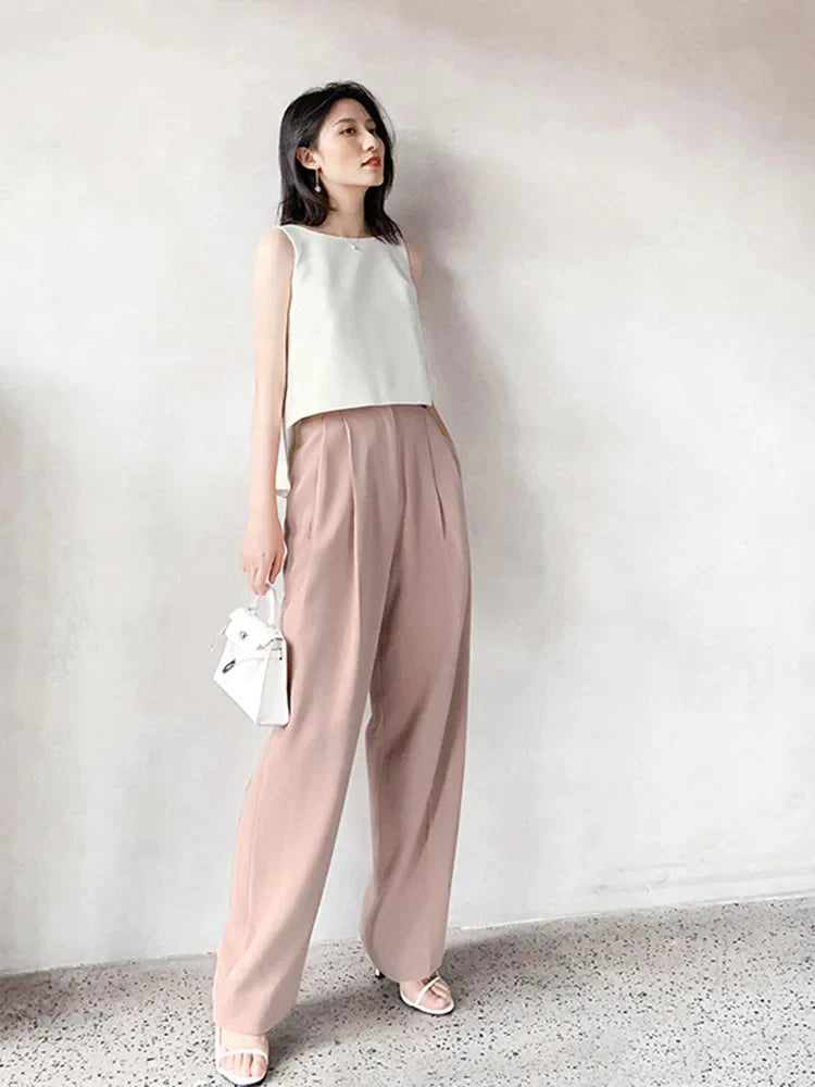 EAM-Women-White-Backless-Pleated-Irregular-Tank-Tops-New-O-collar-Sleeveless-Personality-Fashion-Spring_79f6b6d4-2f60-4240-8963-baf85b436fbc.webp